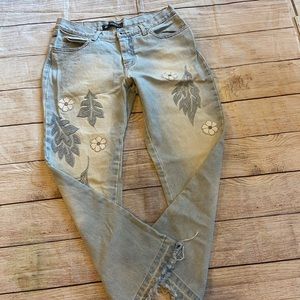 Light blue floral patterned high wasted mom jeans.  women’s size 46 Regular.